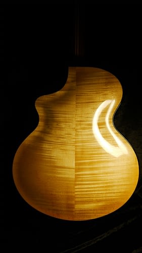 hand carved curly maple handmade archtop guitar back french polished
